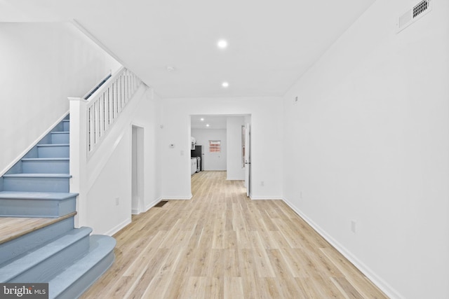 interior space with hardwood / wood-style flooring