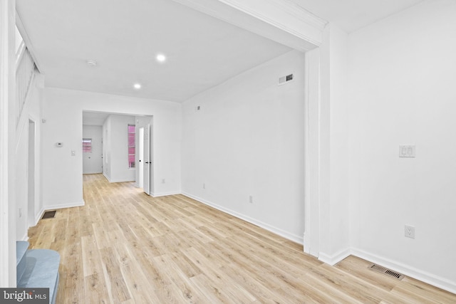 spare room featuring light hardwood / wood-style flooring