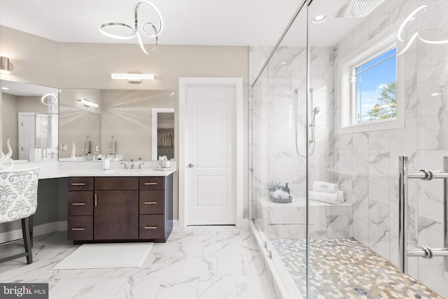 bathroom featuring vanity and an enclosed shower