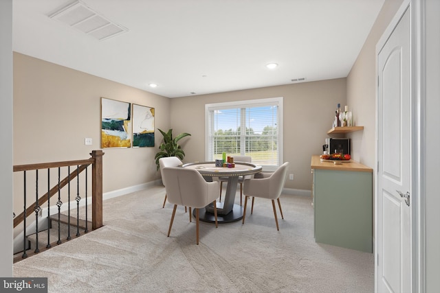 dining area with carpet flooring