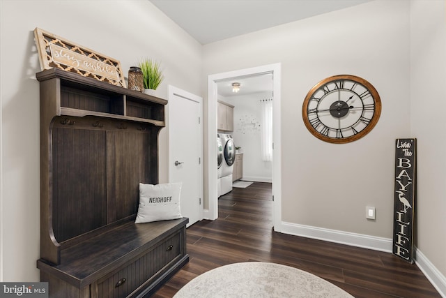 mudroom featuring dark hardwood / wood-style flooring and independent washer and dryer