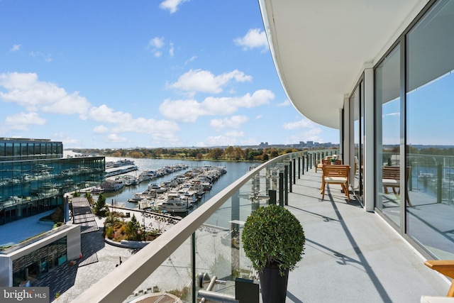 balcony featuring a water view