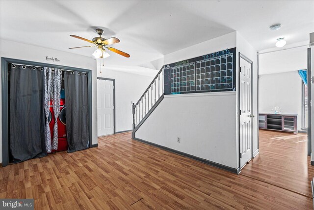 interior space featuring ceiling fan and wood-type flooring