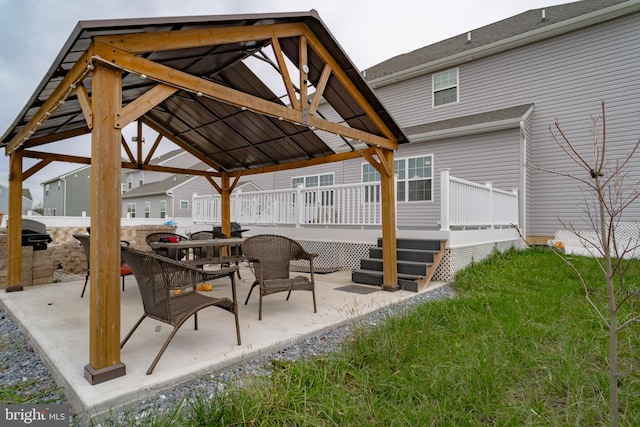 view of patio / terrace featuring a gazebo and a deck