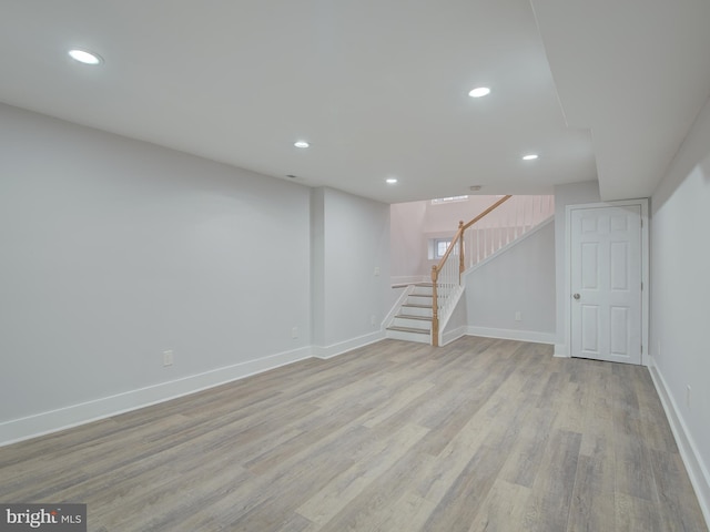 basement featuring light hardwood / wood-style flooring