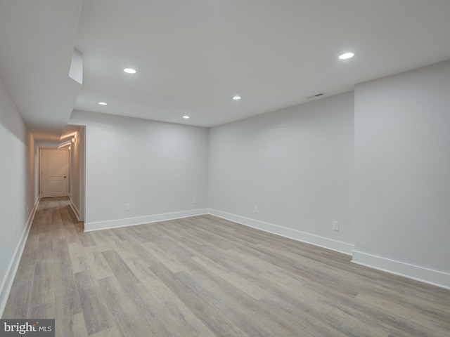 spare room with light wood-type flooring