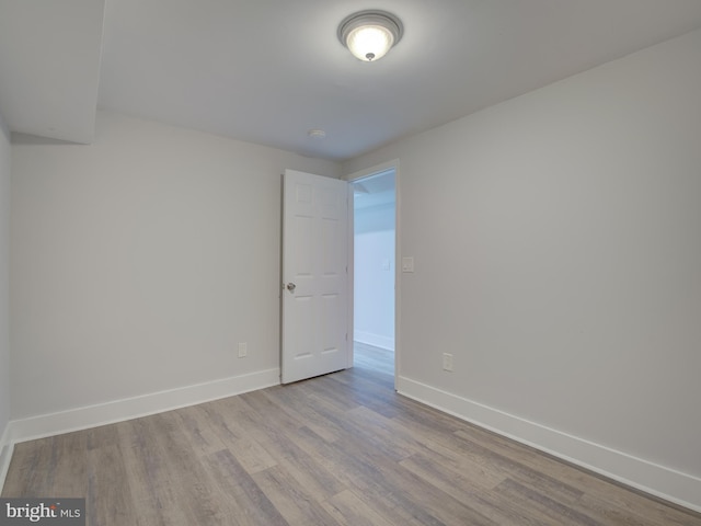 unfurnished room featuring light wood-type flooring