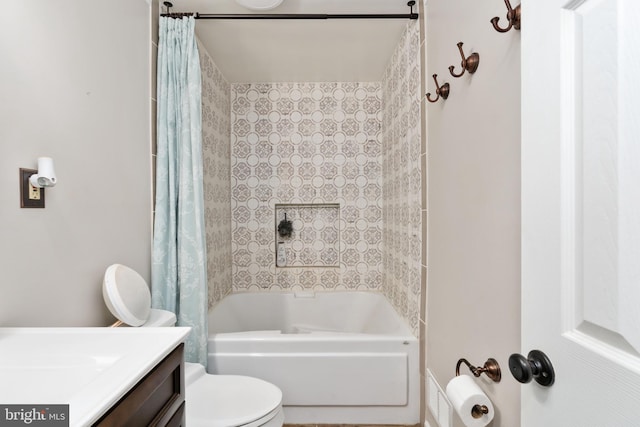 full bathroom with vanity, toilet, and shower / bath combo with shower curtain