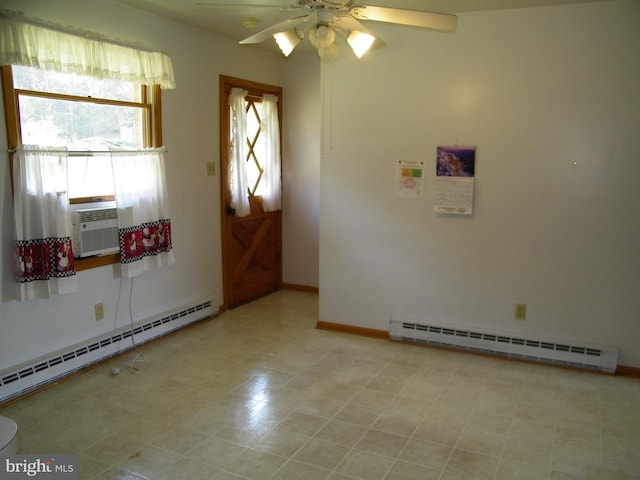 interior space featuring cooling unit, ceiling fan, and a baseboard heating unit