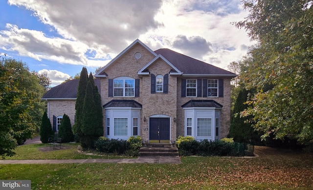 view of front facade with a front yard