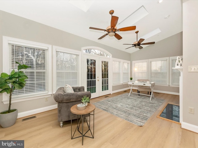 sunroom with french doors, vaulted ceiling, and ceiling fan