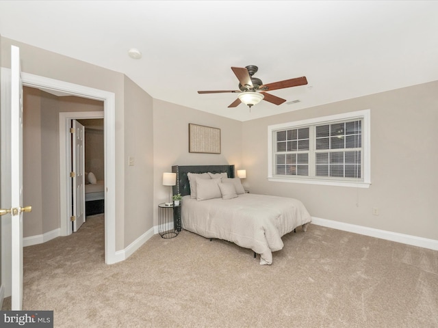 bedroom with light colored carpet and ceiling fan