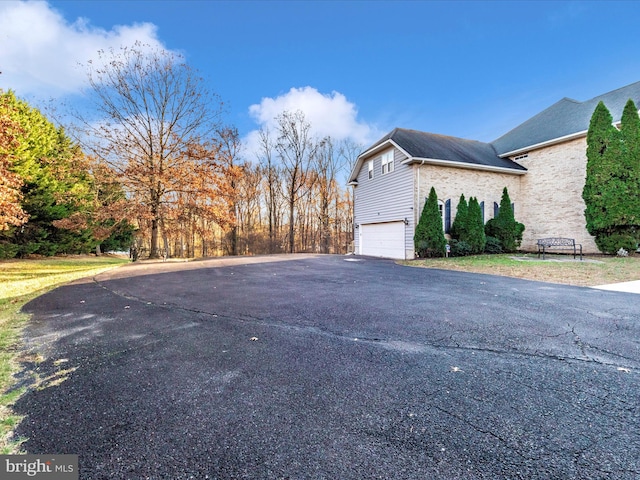 view of home's exterior featuring a garage