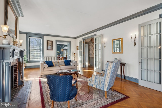 living room with radiator, french doors, parquet floors, and ornamental molding