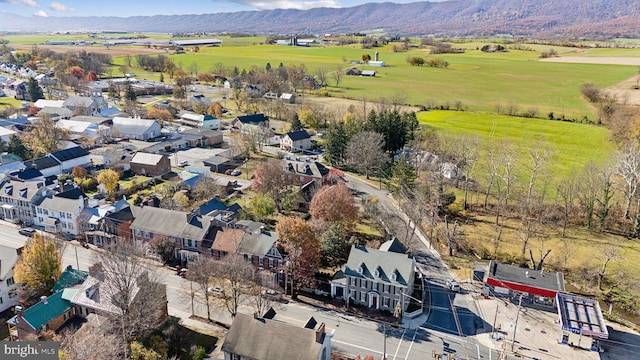 drone / aerial view featuring a mountain view