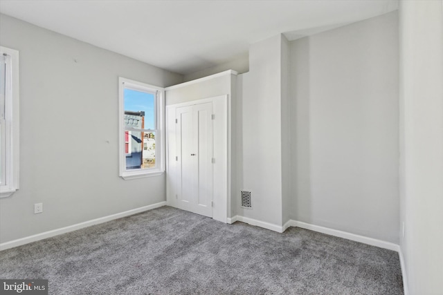 view of carpeted spare room