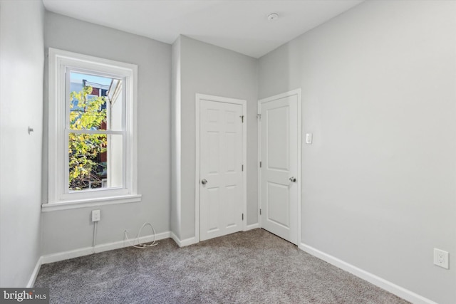 interior space with light colored carpet