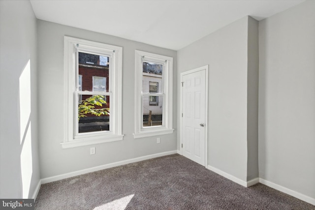 empty room with carpet floors