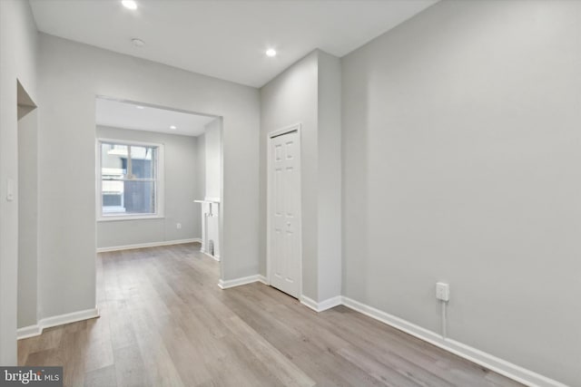 hallway featuring light wood-type flooring