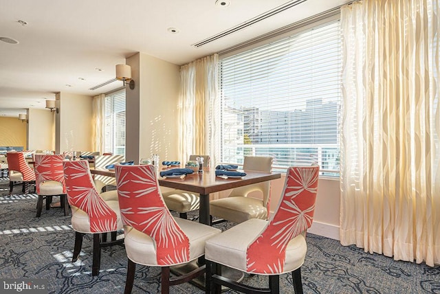 dining space with carpet floors