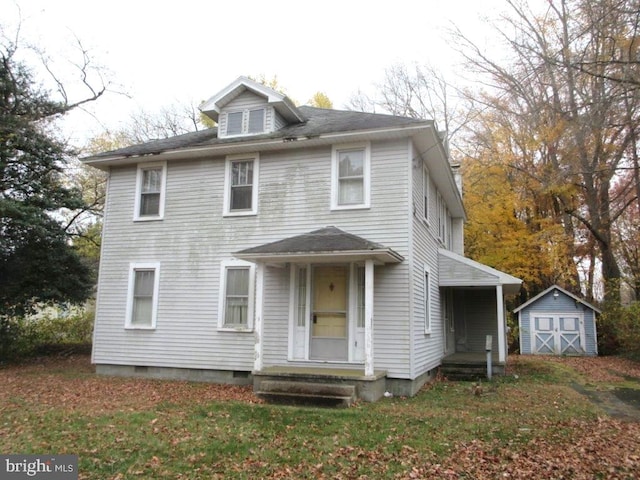 front of property featuring a storage unit