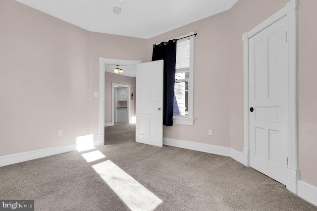 unfurnished room featuring carpet floors