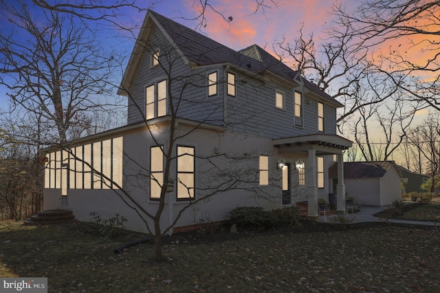 view of property exterior at dusk