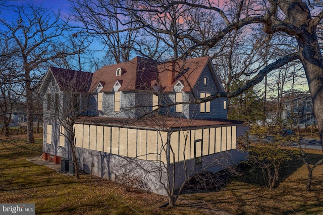 view of property exterior at dusk