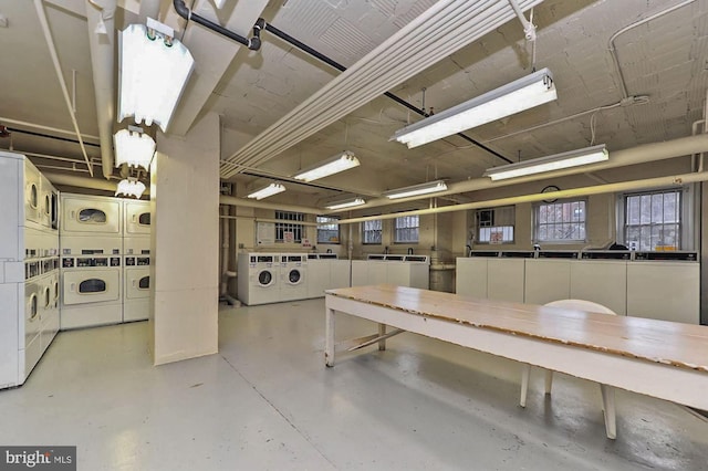 interior space featuring washing machine and dryer and stacked washer / drying machine