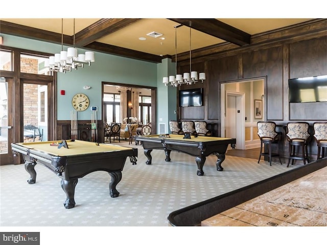 playroom featuring beam ceiling, wooden walls, and pool table