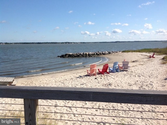 view of water feature with a beach view