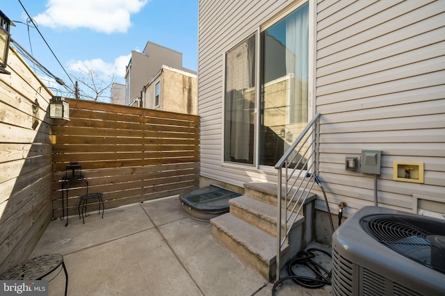 view of patio / terrace featuring central air condition unit