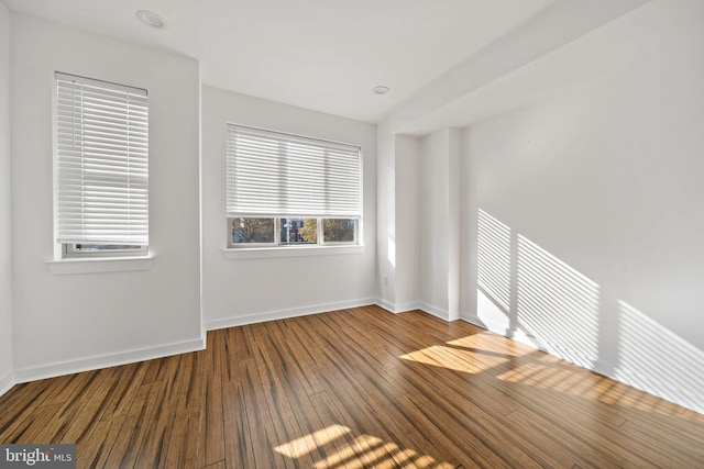 empty room featuring hardwood / wood-style floors