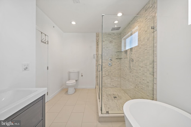 full bathroom featuring tile patterned flooring, vanity, toilet, and plus walk in shower