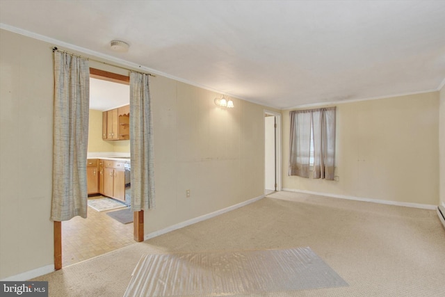 carpeted empty room with ornamental molding