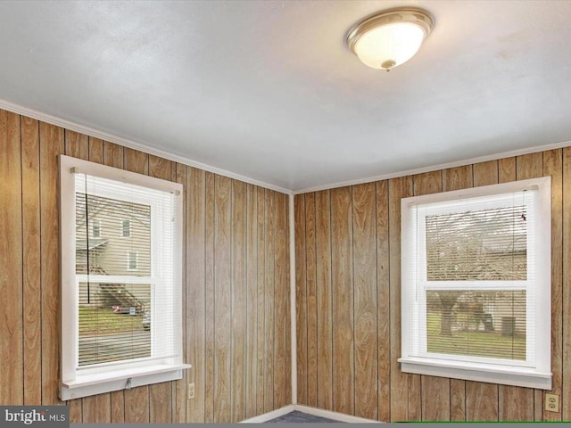 empty room with wooden walls