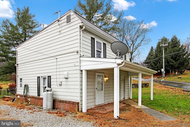 view of home's exterior featuring a lawn