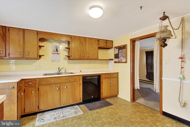 kitchen featuring tasteful backsplash, dishwasher, a baseboard radiator, and sink