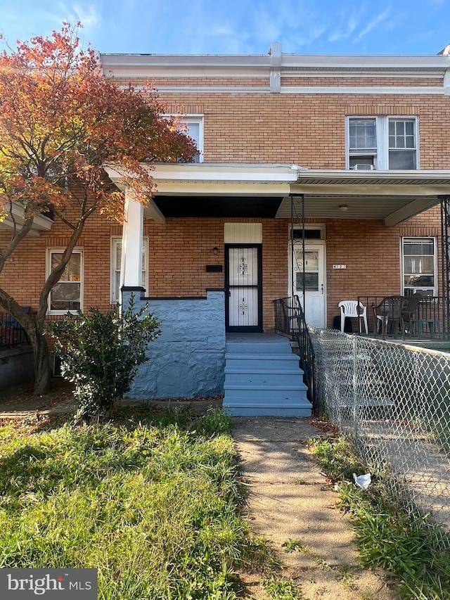 multi unit property featuring covered porch