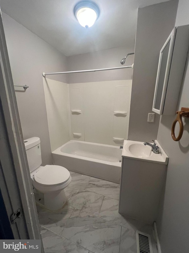 full bathroom featuring shower / bathing tub combination, vanity, and toilet