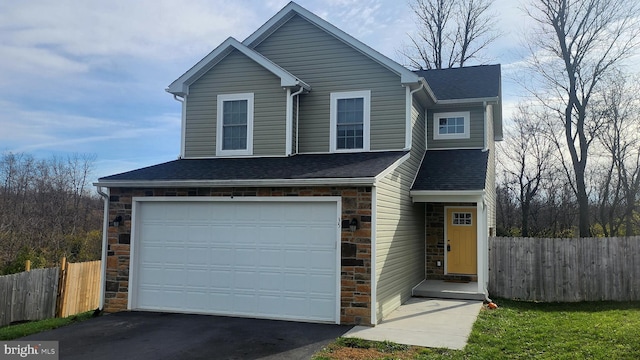 view of front of house with a garage