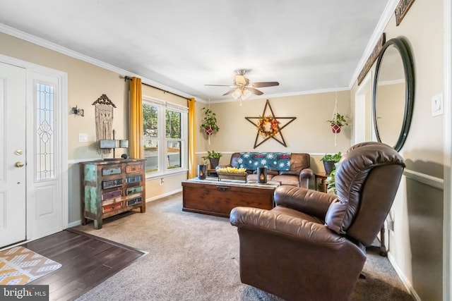 living room featuring crown molding, ceiling fan, and light hardwood / wood-style floors