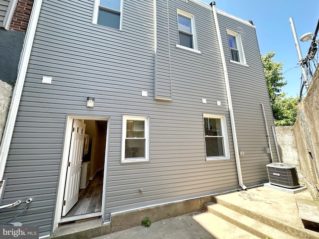 back of property with cooling unit