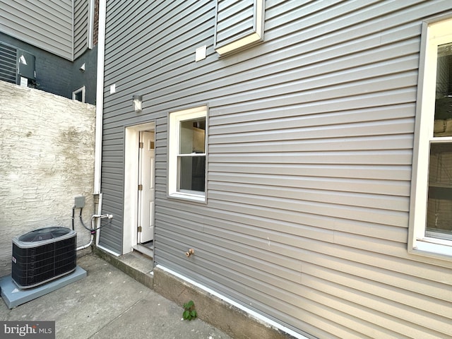 property entrance with central air condition unit