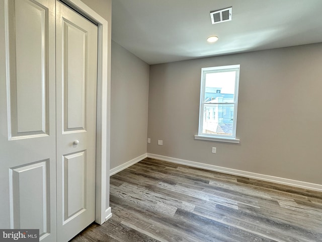 empty room featuring hardwood / wood-style floors