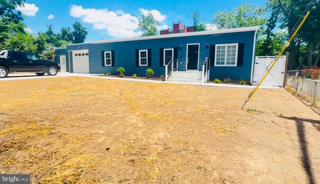 ranch-style home with a garage