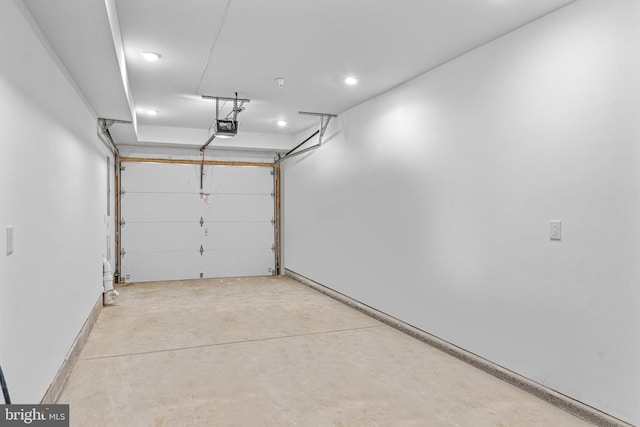 garage featuring a garage door opener