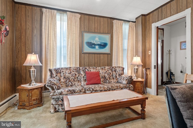 living room with light carpet, wooden walls, and a baseboard heating unit