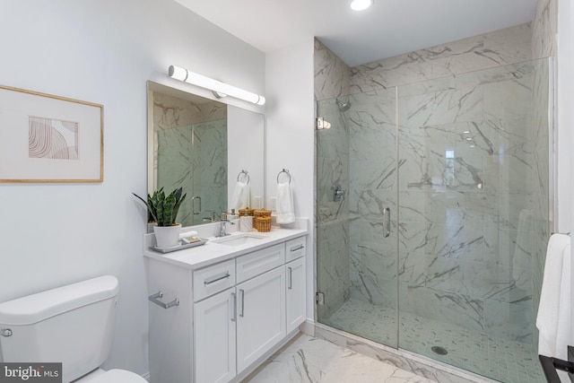 bathroom featuring walk in shower, vanity, and toilet