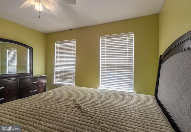 bedroom with carpet and ceiling fan